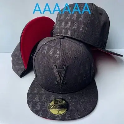 New Era All-Over Logo Fitted Caps · New Era