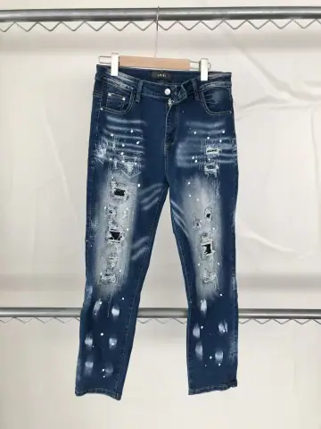 Amiri Splatter Paint Ripped Slim Jeans · AMIRI