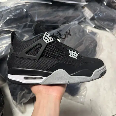 Air Jordan 4 Retro Black Canvas · Jordan