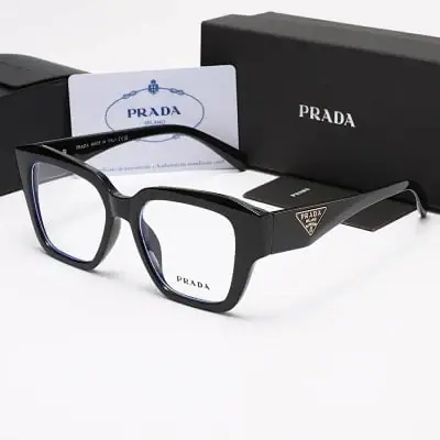Prada Triangle Glasses · Prada