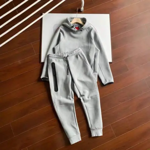 A grey tracksuit from the Nike Tech Fleece · Nike