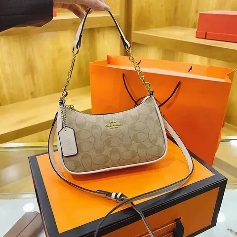 Coach classic monogram crescent-shaped underarm bag · Coach