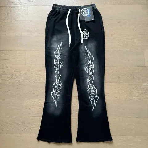 Hellstar Flame-Print Flared Sweatpants · Hellstar