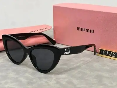 Miu Miu Cat-Eye Sunglasses · Miu Miu