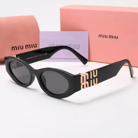 Miu Miu Oval Sunglasses · Miu Miu