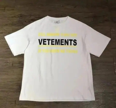 VETEMENTS Slogan-Print T-Shirt · Vetements